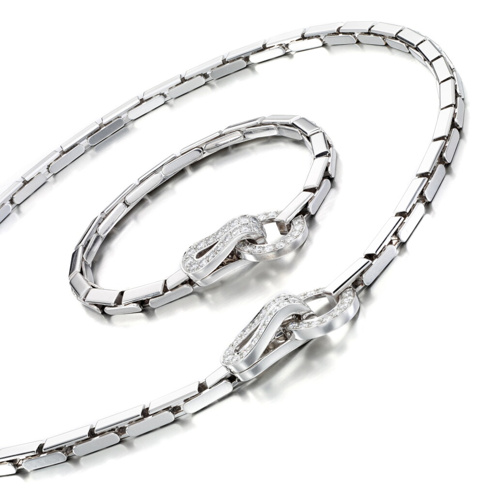 View full screen - View 1 of Lot 19. Diamond demi parure, 'Agrafe'.