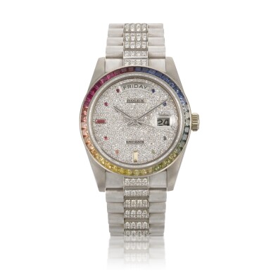 View full screen - View 1 of Lot 8. 'Rainbow Khanjar' Day-Date, ref. 18059 White gold and diamond and sapphire-set wristwatch Circa 1984.