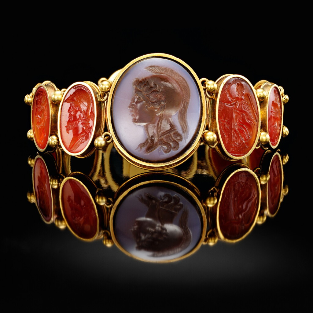 View full screen - View 1 of Lot 286. Bracelet set with intaglios; centred on a large cameo with Minerva.
