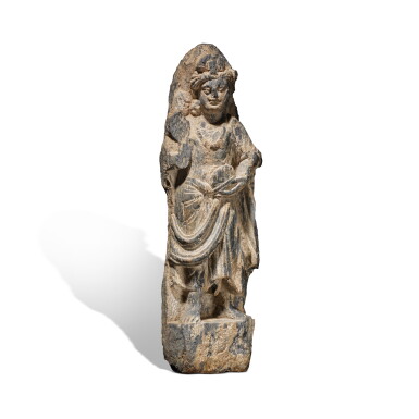 View full screen - View 1 of Lot 1139. A small schist standing figure of a bodhisattva, ancient region of Gandhara, 2nd - 3rd century.