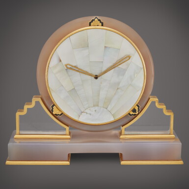 View full screen - View 1 of Lot 484. A mother of pearl agate rock crystal and gilt brass desk timepiece, Circa 1980.