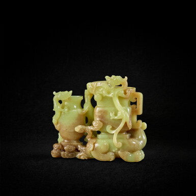 View full screen - View 1 of Lot 871. A yellow jade 'dragon and phoenix' double vase, Qing dynasty, 18th century | 清十八世紀 黃玉仿古龍鳳紋雙聯花插.
