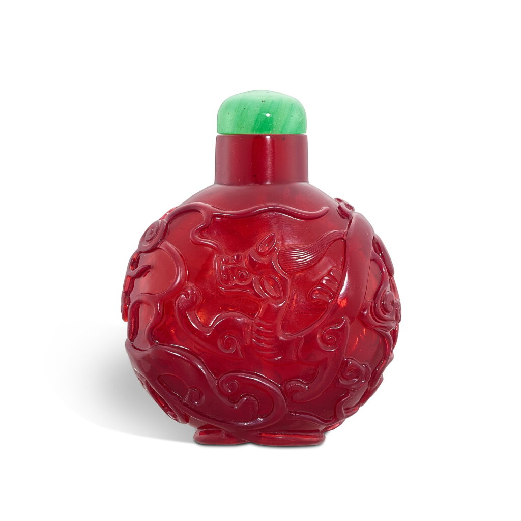 View full screen - View 1 of Lot 576. An imperial red glass 'chilong' snuff bottle, Qing dynasty, Qianlong period 清乾隆 御製寶石紅料螭龍紋鼻煙壺.