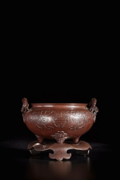 View full screen - View 1 of Lot 235. A bronze 'chilong' tripod censer and stand, Qing dynasty, 18th century.