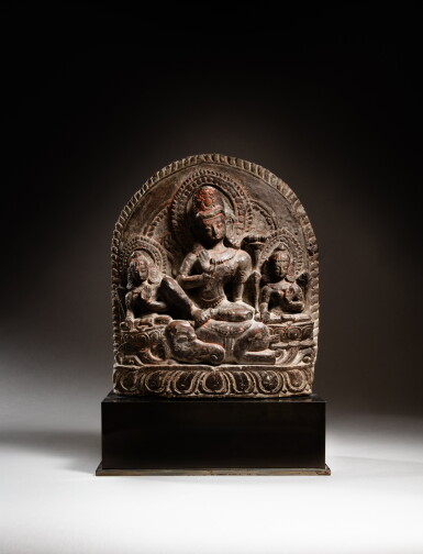 View full screen - View 1 of Lot 144. A stone seated figure of Indra, Nepal, Mala period, 15th - 16th century | 尼泊爾 馬拉王朝十五至十六世紀 石雕因陀羅坐像.