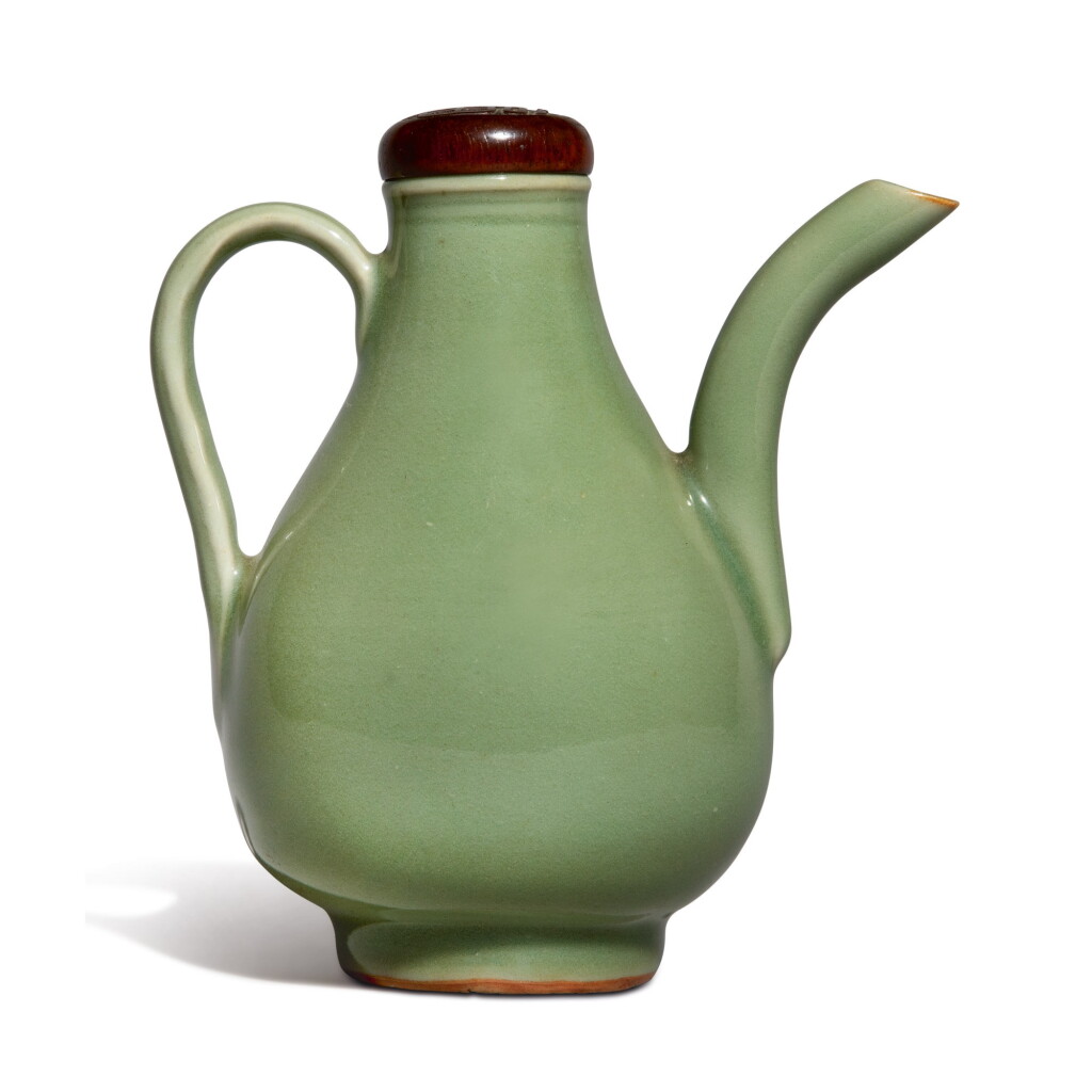 View full screen - View 1 of Lot 502. A 'LONGQUAN' CELADON-GLAZED EWER, YUAN / MING DYNASTY .