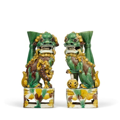 View full screen - View 1 of Lot 285. A pair of famille-verte biscuit porcelain incense holders modelled as seated lions, Qing dynasty, Kangxi period.