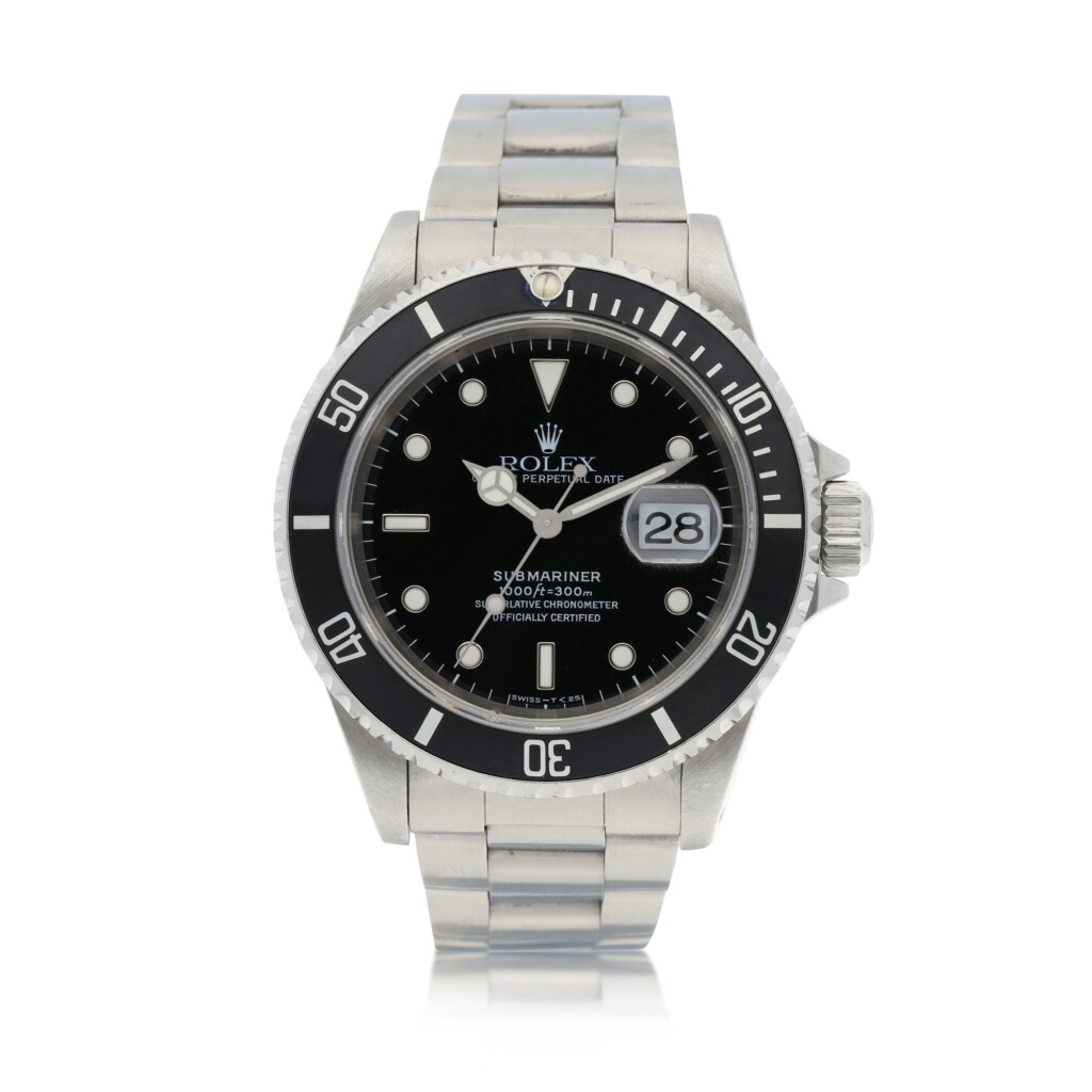 View full screen - View 1 of Lot 9234. Rolex | Submariner, Reference 16610, A stainless steel wristwatch with date and bracelet, Circa 1997 | 勞力士 | Submariner 型號16610 精鋼鏈帶腕錶,備日期顯示,約1997年製.