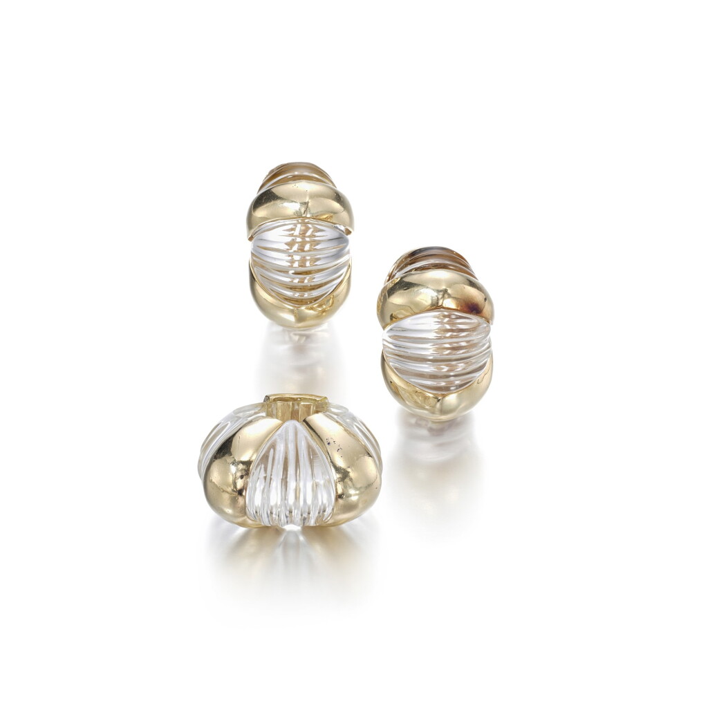 View full screen - View 1 of Lot 1123. Pair of gold and rock crystal ear clips and a ring.