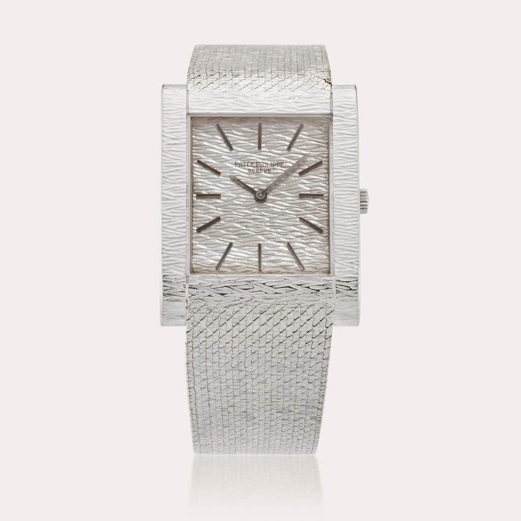 View full screen - View 1 of Lot 410. Reference 3553 1 | A white gold rectangular bracelet watch, Circa 1973.