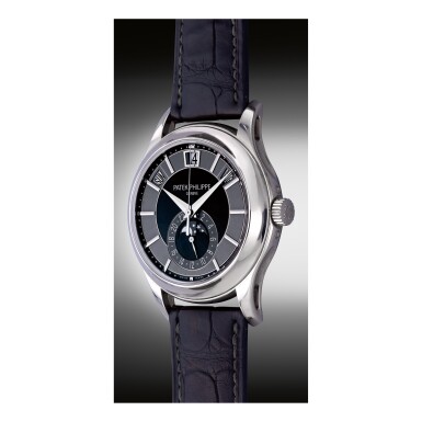 View full screen - View 1 of Lot 904. PATEK PHILIPPE | REF 5205G, A WHITE GOLD AUTOMATIC ANNUAL CALENDAR WRISTWATCH WITH MOON PHASES, MADE IN 2013 | 百達翡麗 | 5205G型號白金自動上鏈年曆腕錶備月相顯示,2013年製.