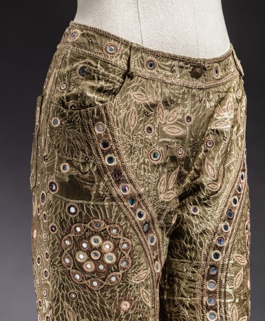 View full screen - View 1 of Lot 325. Brown cashmere jacket and bronze shimmering woven pants embroidered with mirror rhodoid, two Dior "Malice" bags by John Galliano.