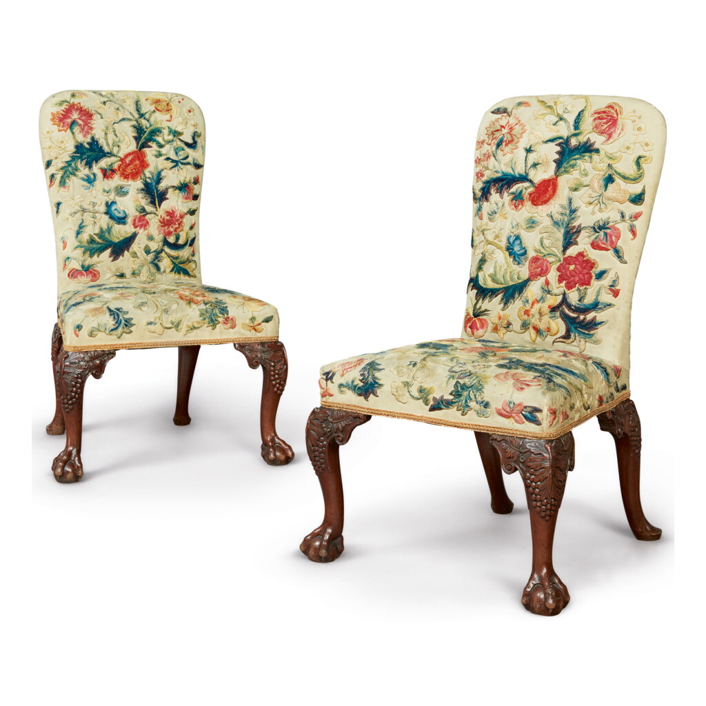 View full screen - View 1 of Lot 119. A PAIR OF GEORGE II CREWELWORK-UPHOLSTERED WALNUT SIDE CHAIRS, CIRCA 1740.