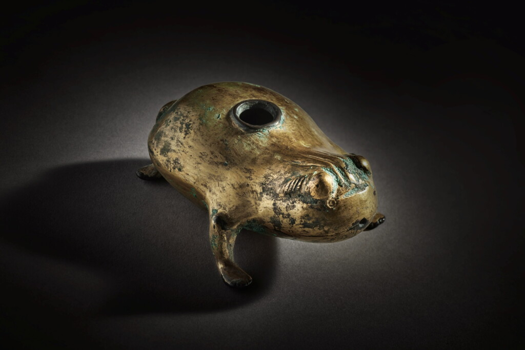 View full screen - View 1 of Lot 169. A gilt-bronze three-legged-toad-form water dropper, Han dynasty .