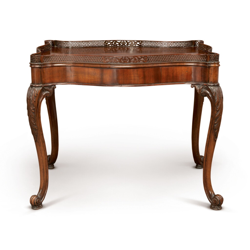 View full screen - View 1 of Lot 585. A GEORGE II STYLE MAHOGANY SILVER TABLE, 19TH CENTURY.