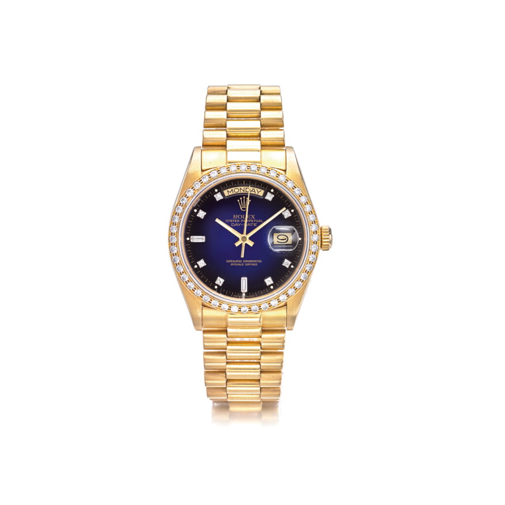View full screen - View 1 of Lot 1063. ROLEX | REF 18048/18000 DAY-DATE, A YELLOW GOLD AND DIAMOND-SET AUTOMATIC CENTER SECONDS WRISTWATCH WITH DAY DATE AND BRACELET, CIRCA 1980 | 勞力士 |18048/18000型號「DAY-DATE」黃金鑲鑽石自動上鏈鍊帶腕錶備星期及日期顯示,年份約1980.