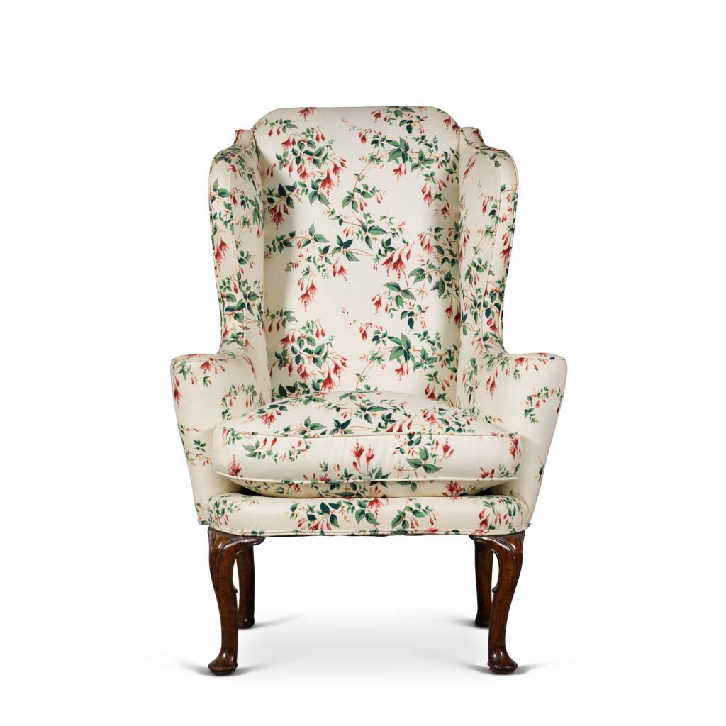 View full screen - View 1 of Lot 62. A George I walnut wing armchair, circa 1720.