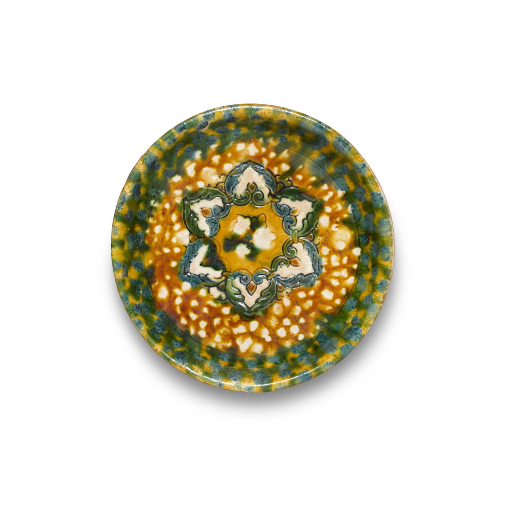 View full screen - View 1 of Lot 113. A blue-splashed sancai-glazed tripod dish, Tang dynasty.