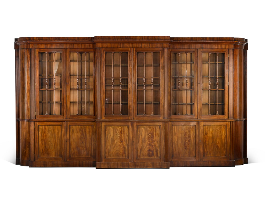 View full screen - View 1 of Lot 101. A large Regency mahogany breakfront bookcase, circa 1820.