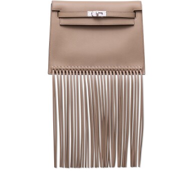 View full screen - View 1 of Lot 1323. Limited Edition Beige Marfa Swift Fringe Kelly Danse II Palladium Hardware, 2023.