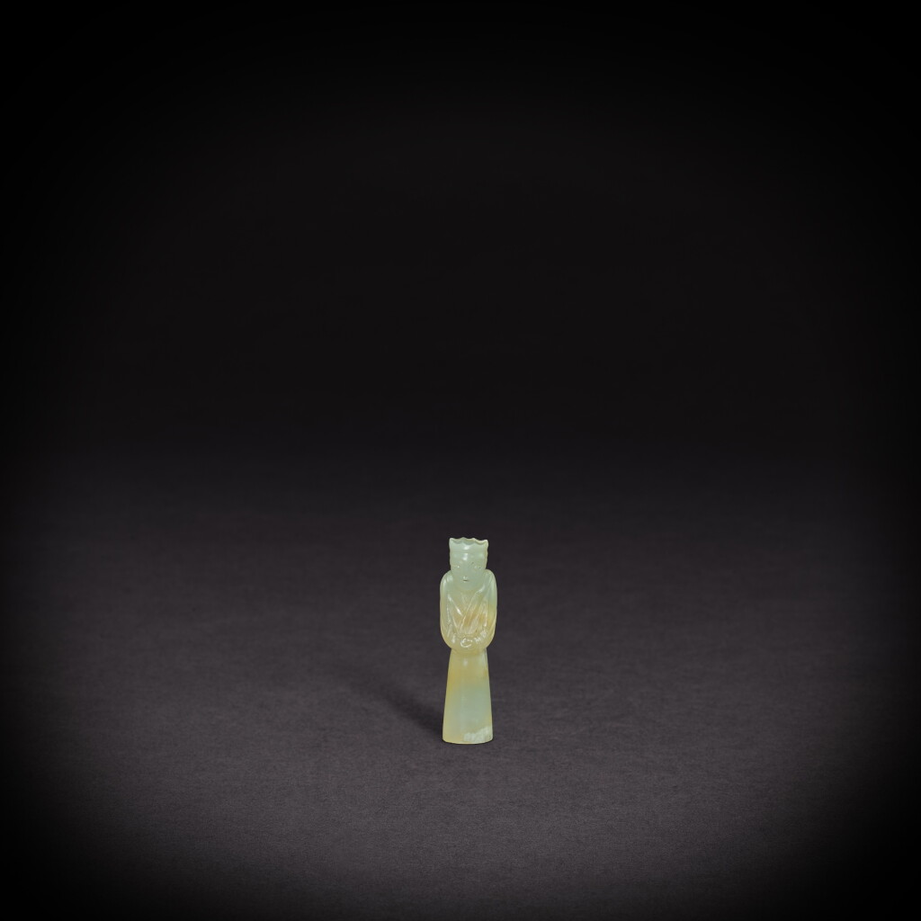 View full screen - View 1 of Lot 3520. A white jade figure, wengzhong, Ming dynasty or earlier | 明或更早 白玉翁仲.
