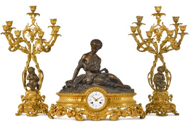 View full screen - View 1 of Lot 25. A GILT AND PATINATED BRONZE MANTEL CLOCK GARNITURE, RAINGO FRÈRES, PARIS, CIRCA 1860.