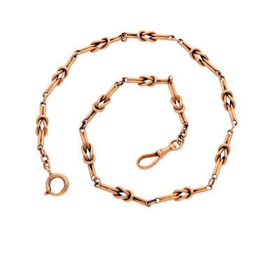 View full screen - View 1 of Lot 253. A pink gold fetter and knot watch chain circa 1905.