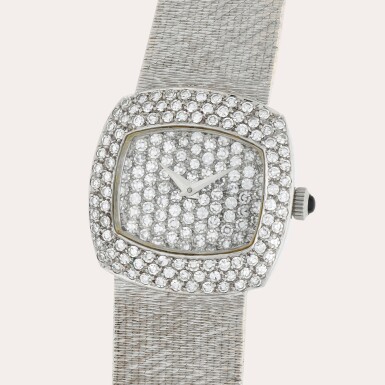 View full screen - View 1 of Lot 423. 'Khanjar' | A white gold and diamond-set bracelet watch | Circa 1990.