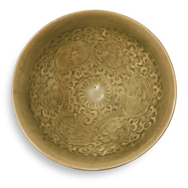 View full screen - View 1 of Lot 1234. A carved 'Yaozhou' 'floral' conical bowl, Northern Song / Jin dynasty | 北宋 / 金 耀州窰纏枝花卉紋盌.