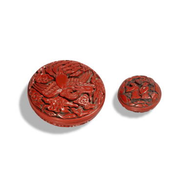 View full screen - View 1 of Lot 206. A small carved cinnabar lacquer 'phoenix' box and cover, Qing dynasty, 18th / 19th century | 清十八 / 十九世紀 剔紅鳳凰紋蓋盒 及 剔紅小蓋盒 一組兩件.