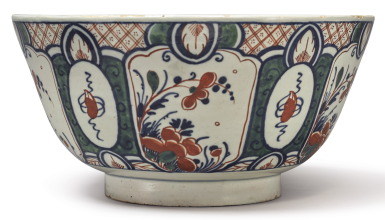 View full screen - View 1 of Lot 1080. A DUTCH DELFT POLYCHROME PUNCH BOWL MID-18TH CENTURY.