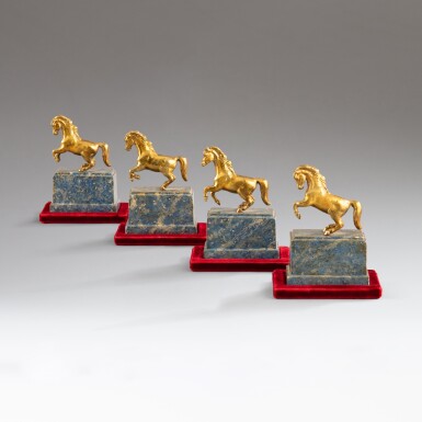 View full screen - View 1 of Lot 131. A set of four Rearing horses | Ensemble de quatre chevaux cabrés.