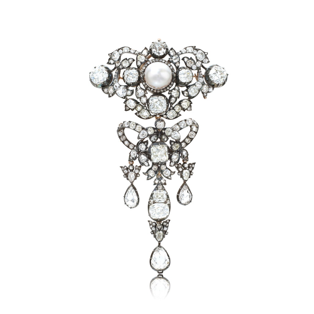View full screen - View 1 of Lot 551. Attractive natural pearl, emerald and diamond devant-de-corsage, circa 1860.