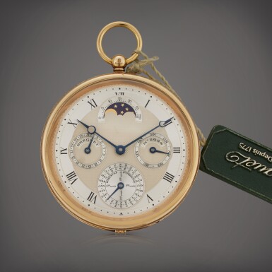 View full screen - View 1 of Lot 90. Reference 1800BA | A yellow gold perpetual calendar open faced watch with moon phases and leap year indication, Circa 2000.