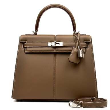 View full screen - View 1 of Lot 1150. Limited Edition Etoupe Swift Padded Kelly 25 Sellier Palladium Hardware, 2022.
