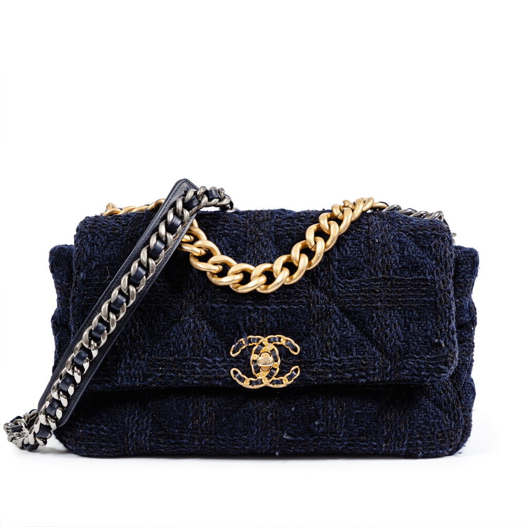 View full screen - View 1 of Lot 739. Black and Navy Blue Quilted Metallic Tweed Medium Chanel 19 Flap Bag Gold Hardware, 2019.