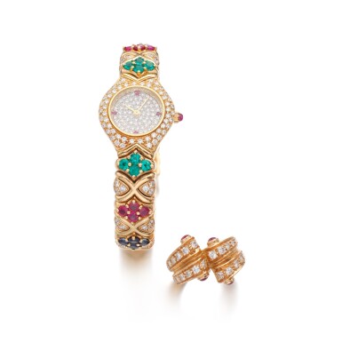 View full screen - View 1 of Lot 835. Gem set and diamond wristwatch and a ruby and diamond ring.