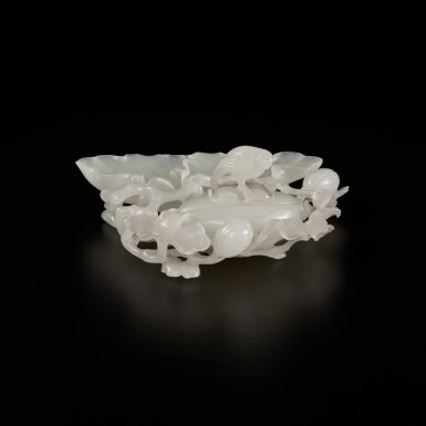 View full screen - View 1 of Lot 369. A white jade 'melon and magpie' brush washer and cover, Qing dynasty, 18th / 19th century | 清十八 / 十九世紀 白玉雕瓜葉形洗.