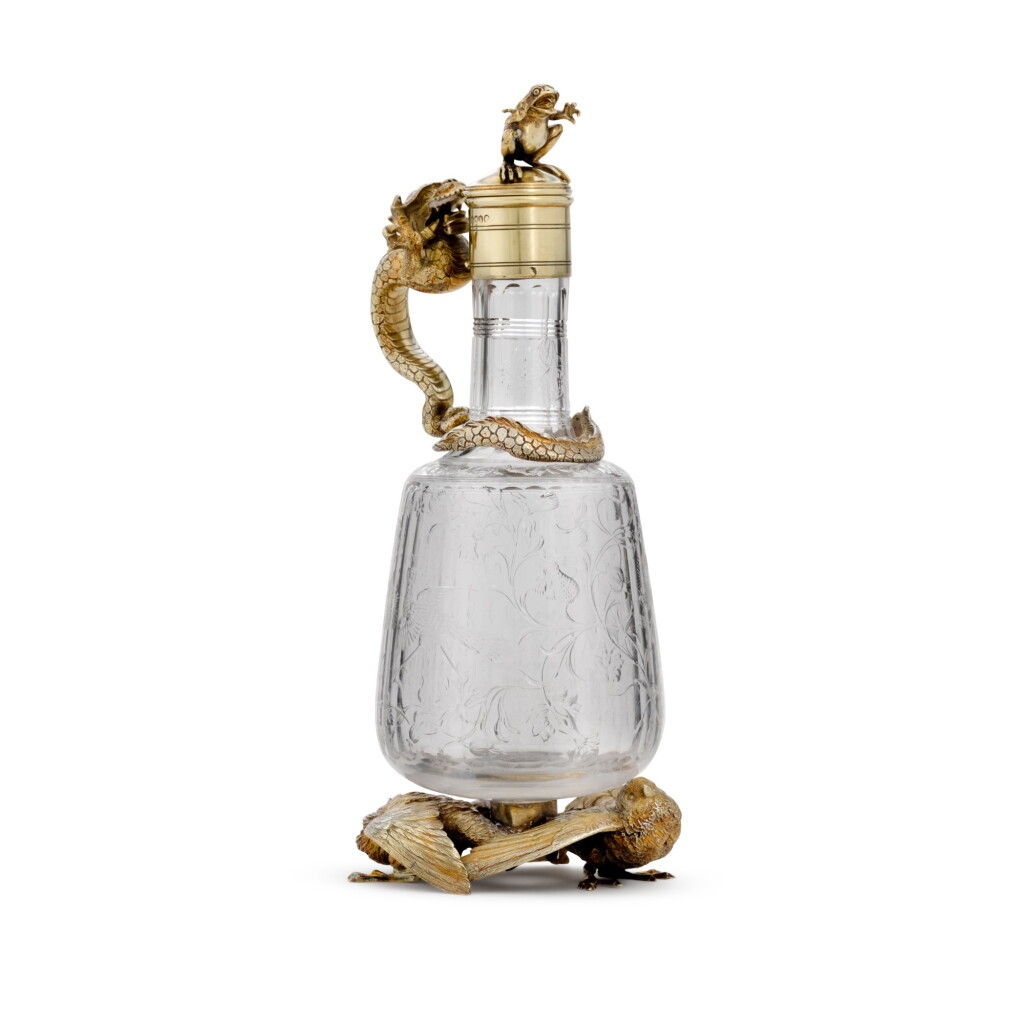 View full screen - View 1 of Lot 80. A Victorian silver-gilt-mounted cut-glass claret jug, William Leuchars for Leuchars & Son, London, 1885.