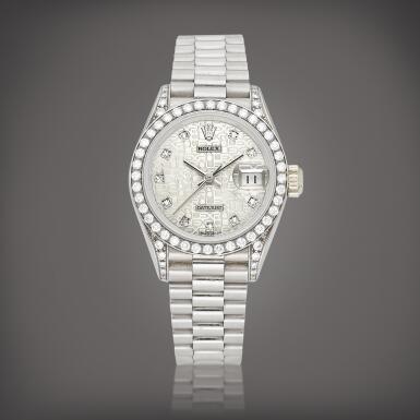 View full screen - View 1 of Lot 8726. DateJust, Reference 69159 | A white gold and diamond-set wristwatch with date and bracelet, Circa 1991 | 勞力士 | DateJust 型號69159 | 白金鑲鑽石鏈帶腕錶,備日期顯示,約1991年製.