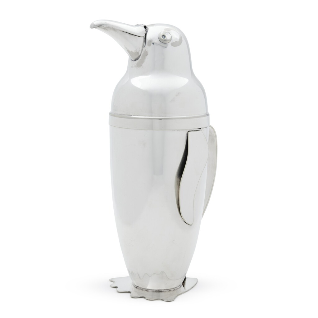 View full screen - View 1 of Lot 103. An American silver-plated Penguin cocktail shaker, designed by Emil Schuelke for The Napier Co., Meriden, CT, circa 1936.