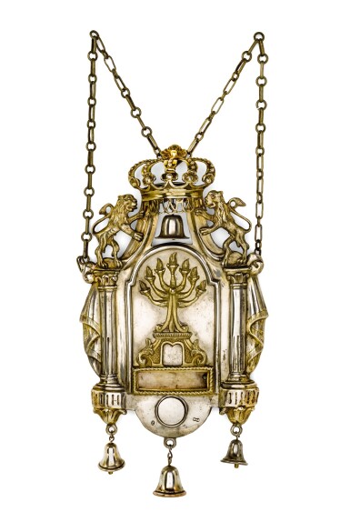 View full screen - View 1 of Lot 99. A GERMAN PARCEL-GILT SILVER HANUKAH LAMP, FRANZ ANTON GUTWEIN, AUGSBURG, 1802.