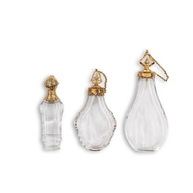 View full screen - View 1 of Lot 605. A group of three gold-mounted glass scent bottles, Paris, mid-18th and early 19th century.