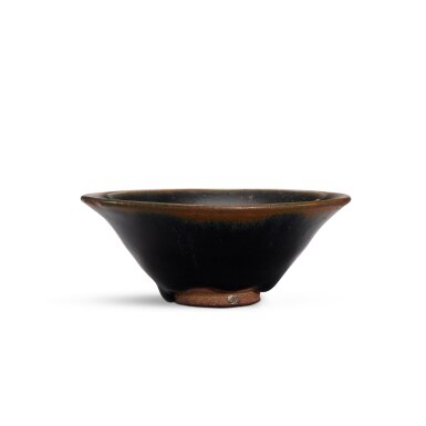 View full screen - View 1 of Lot 625. A Jian black-glazed conical bowl, Song dynasty 宋 建窰烏金釉斗笠盌.