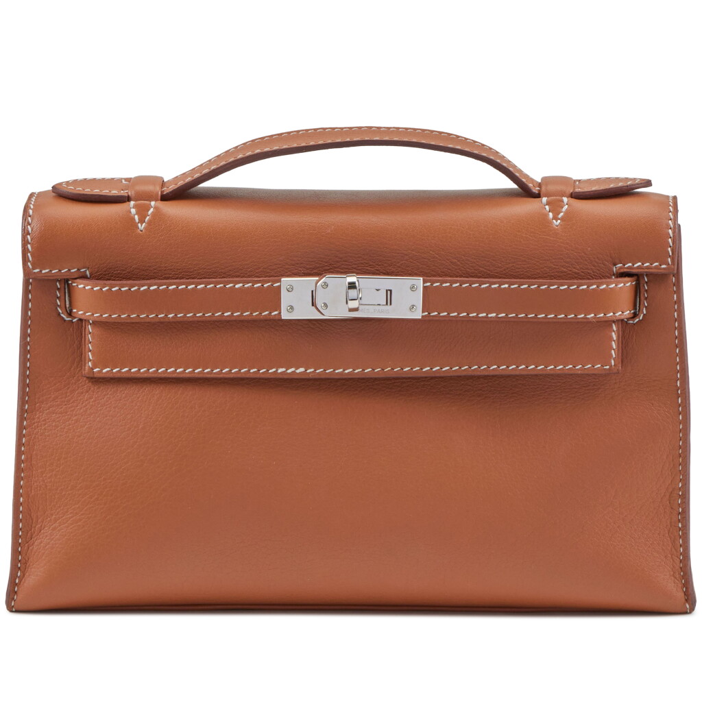 View full screen - View 1 of Lot 12. Gold Swift Kelly Pochette Palladium Hardware, 2012.