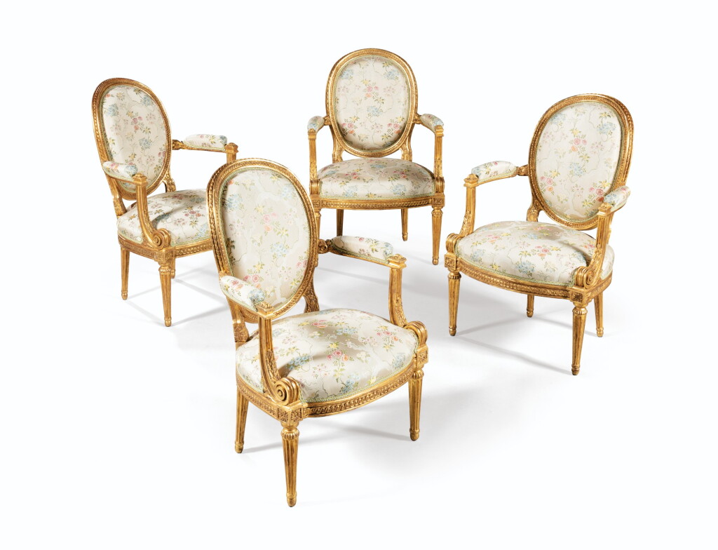 View full screen - View 1 of Lot 101. A SET OF FOUR LOUIS XVI GILT-WOOD ARMCHAIRS, ATTRIBUTED TO LOUIS DELANOIS | SUITE DE QUATRE FAUTEUILS EN BOIS REDORÉ D'ÉPOQUE LOUIS XVI, ATTRIBUÉE À LOUIS DELANOIS.