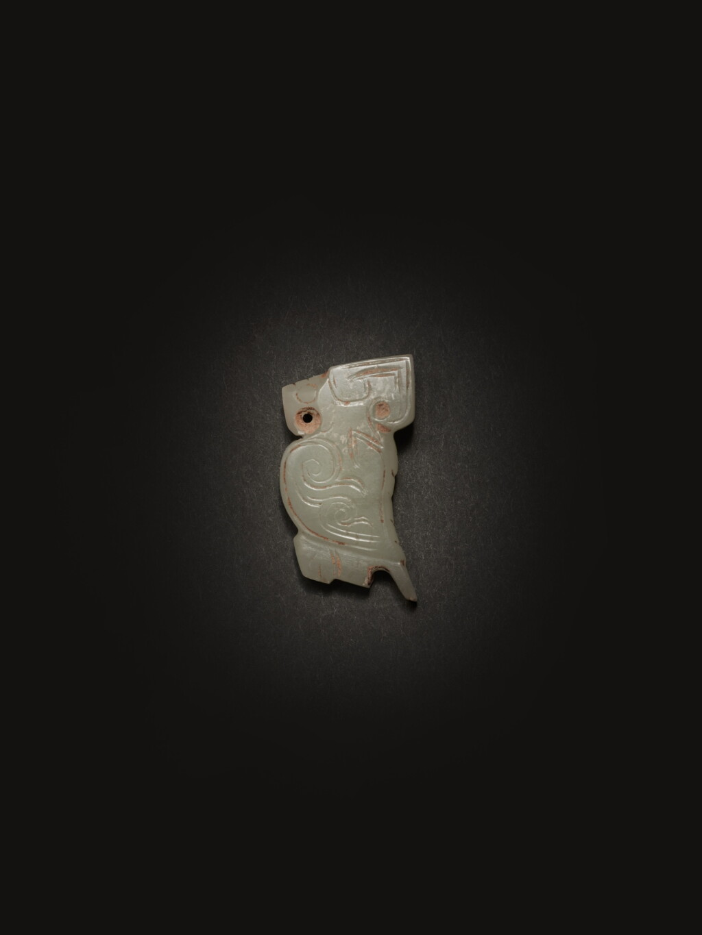 View full screen - View 1 of Lot 234. A small archaic jade bird-form pendant, Shang dynasty | 商 玉鳥形珮.