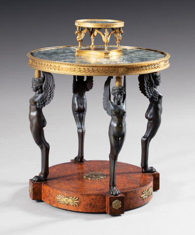 View full screen - View 1 of Lot 18. A patinated and gilt-bronze mounted burr amboyna guéridon attributed to Pierre-Philippe Thomire, Consulat, late 18th century | Guéridon en bronze patiné, doré et placage de loupe d'amboine d'époque Consulat, attribué à Pierre-Philippe Thomire, fin XVIIIe siècle.