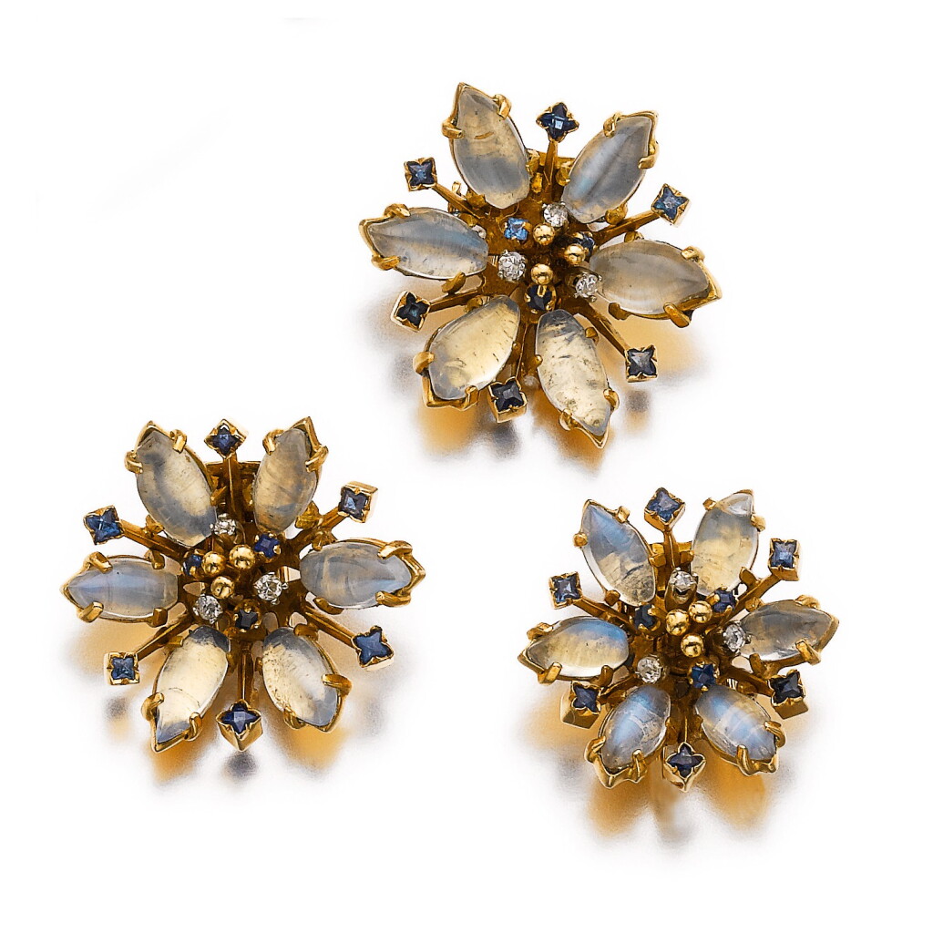 View full screen - View 1 of Lot 586. THREE MOONSTONE, SAPPHIRE AND DIAMOND CLIPS.