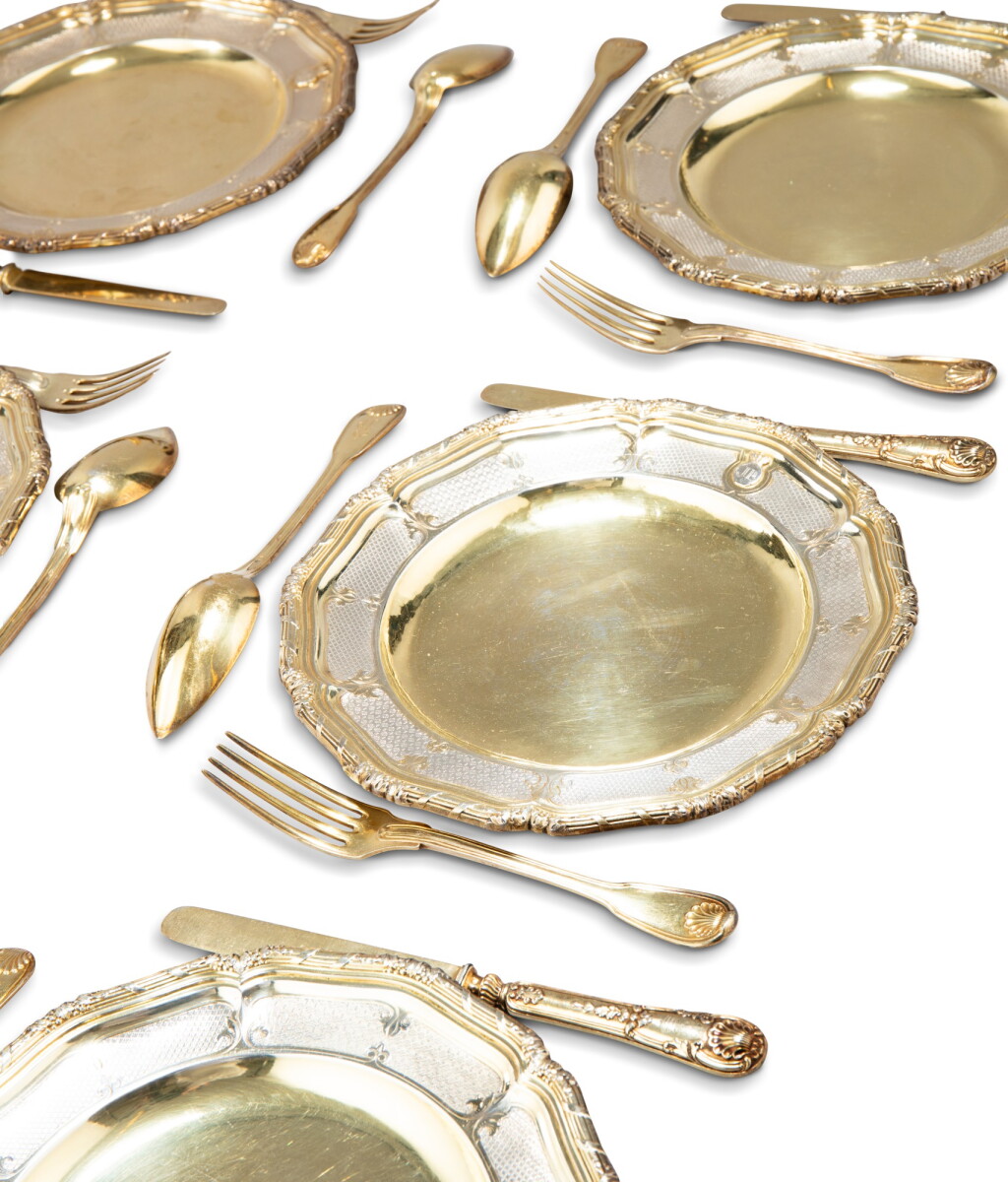 View full screen - View 1 of Lot 399. A silver-gilt set of 24 dessert plates, Lucking and Klonka, Germany, circa 1860, and a 72-piece dessert flatware set, Lavalle and Cardeilhac, Paris circa 1860 | Ensemble de 24 assiettes en vermeil par Lucking et Klonka, Allemagne, vers 1860, et ensemble à dessert comprenant 72 pièces par Lavalle et Cardeilhac, Paris vers 1860.